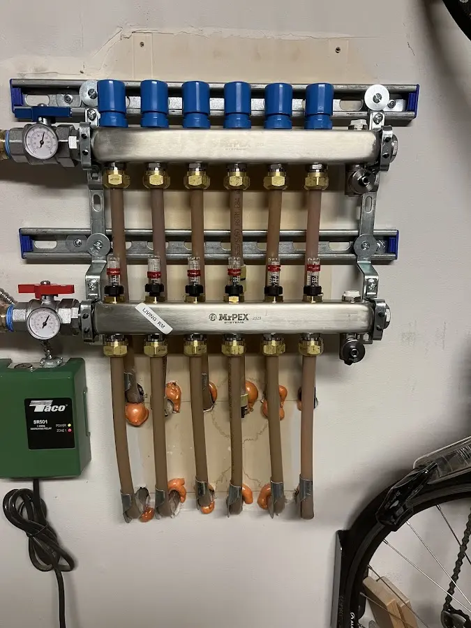 Plumber performing Water Heater Repair at a residential property in Plaistow